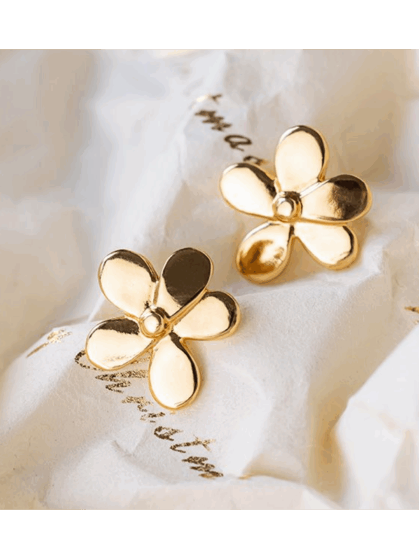 Petites boucles dorées en forme de fleur